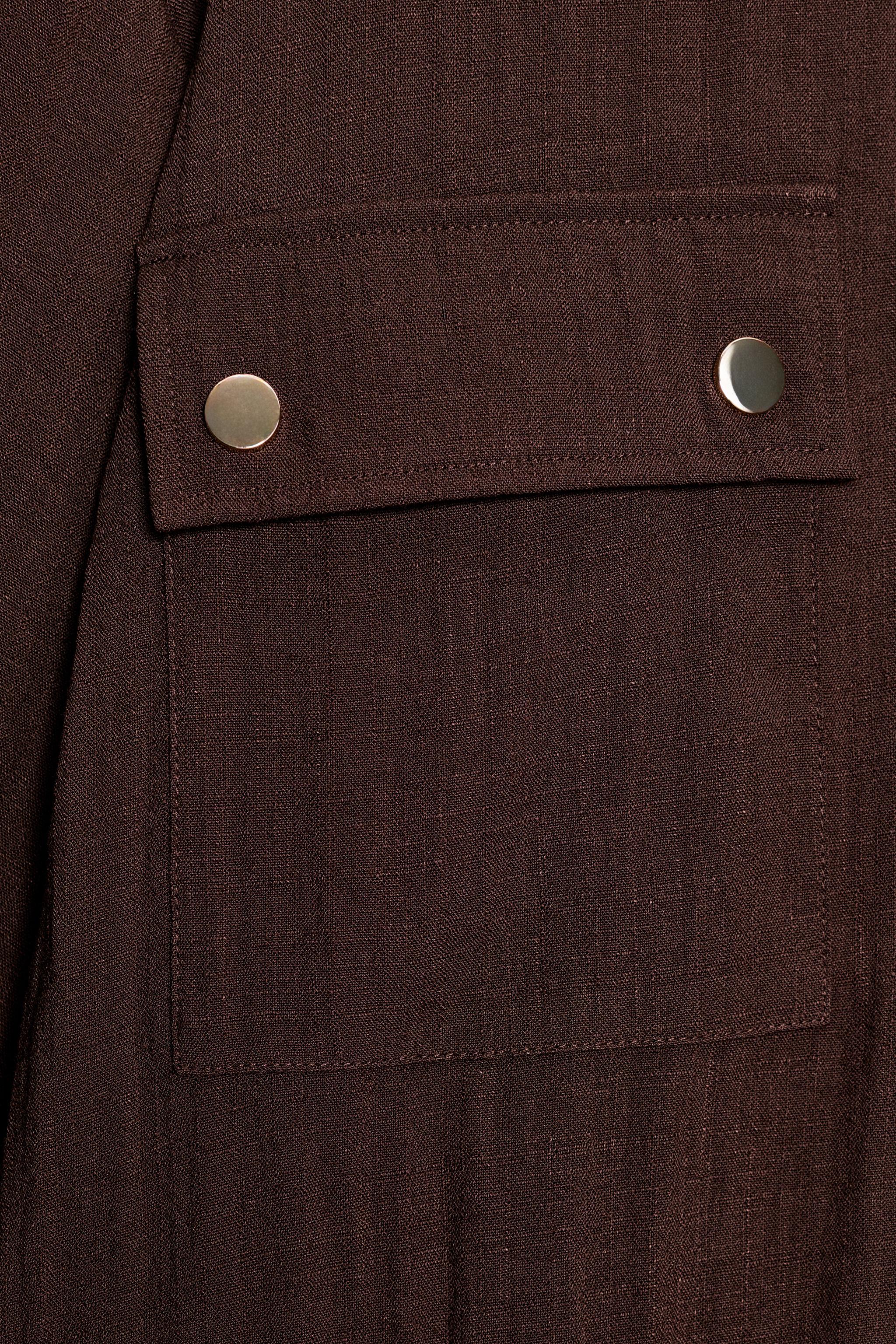VESTE COURTE MANCHES RETROUSSÉES